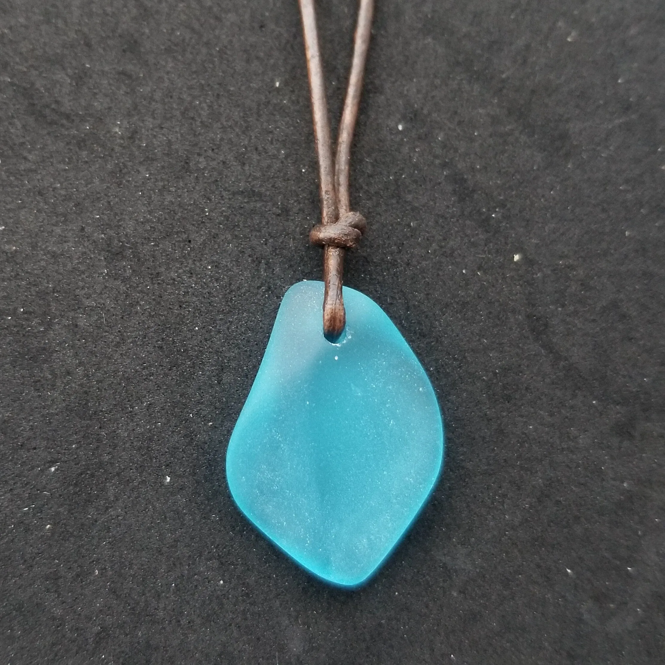 Handmade in Hawaii, leather cord unisex puff blue sea glass necklace, unisex jewelry, birthday gift, sea glass jewelry
